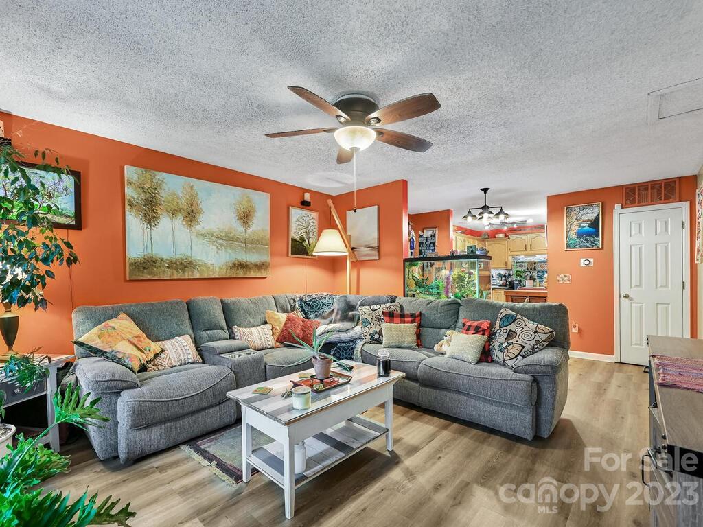 19 Krista Circle, Unit E Candler, NC 28715 - Photo 5 of 23 a living room with furniture and a large window