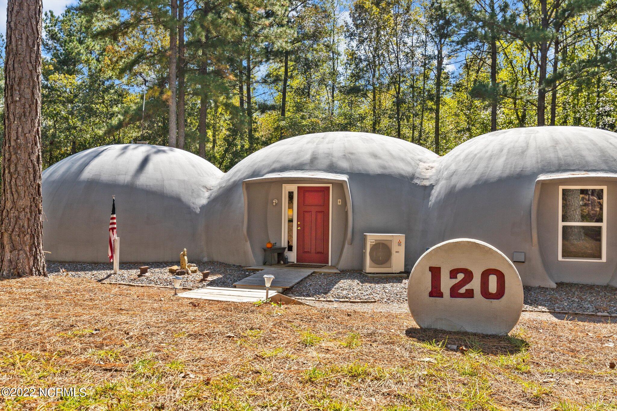 Charming one-level living, energy efficient and secure. Welcome home to the only monolithic dome home in Moore County!