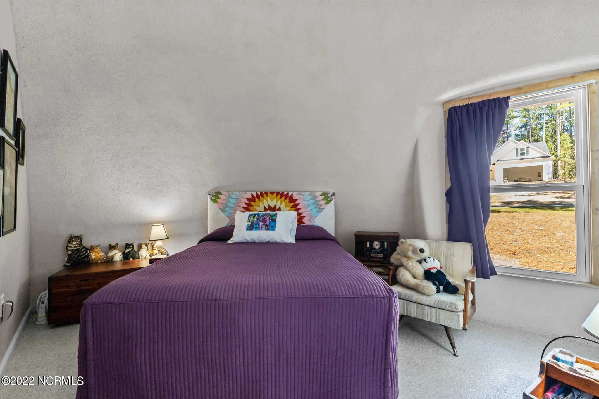 120 Pinebluff Lake Road Pinebluff, NC 28373 - Photo 18 of 40 Bedroom #2. Air exchange unit is in the closet area of this bedroom.