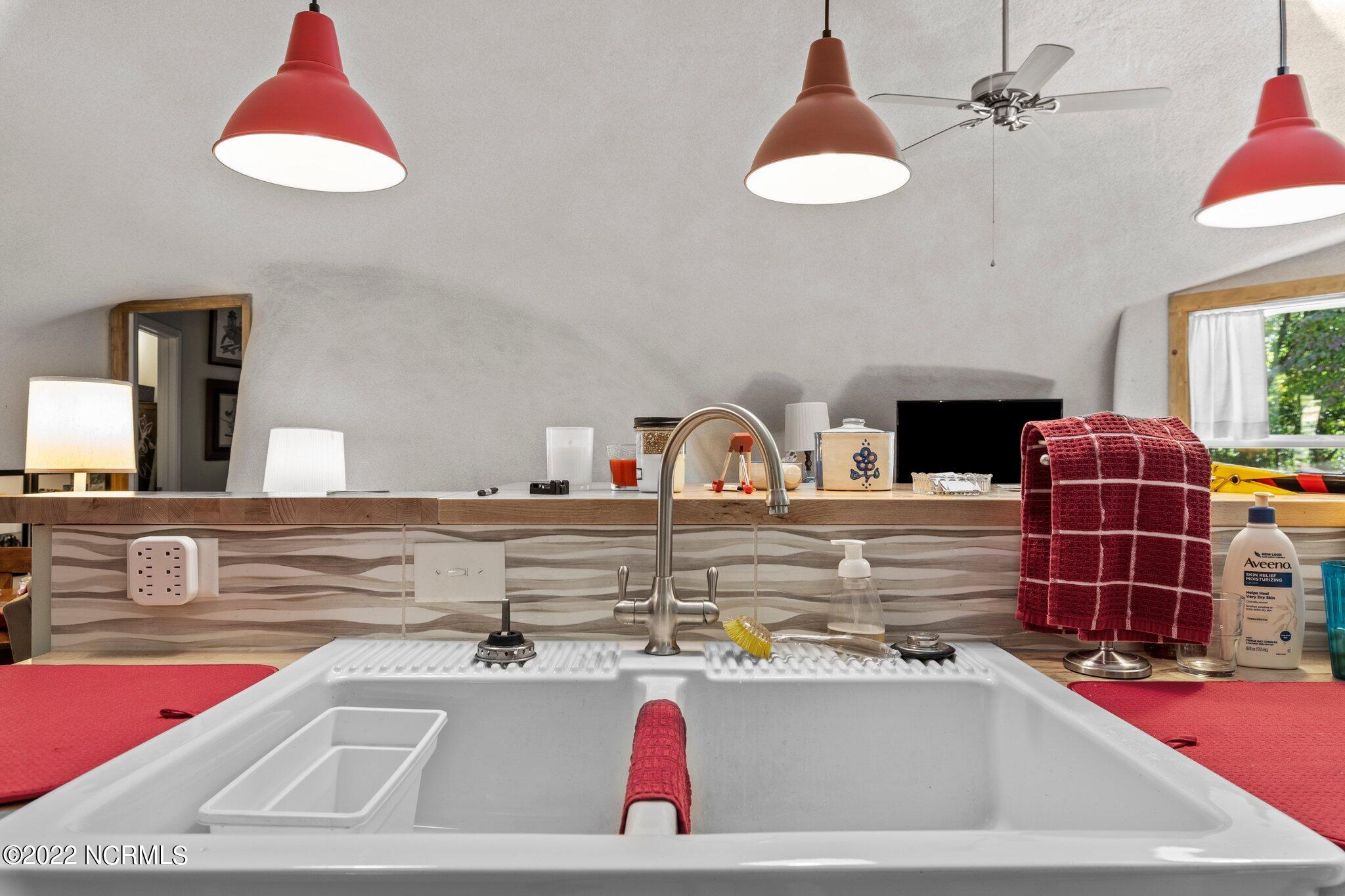 120 Pinebluff Lake Road Pinebluff, NC 28373 - Photo 23 of 40 Kitchen sink faces large family room...great for entertaining.