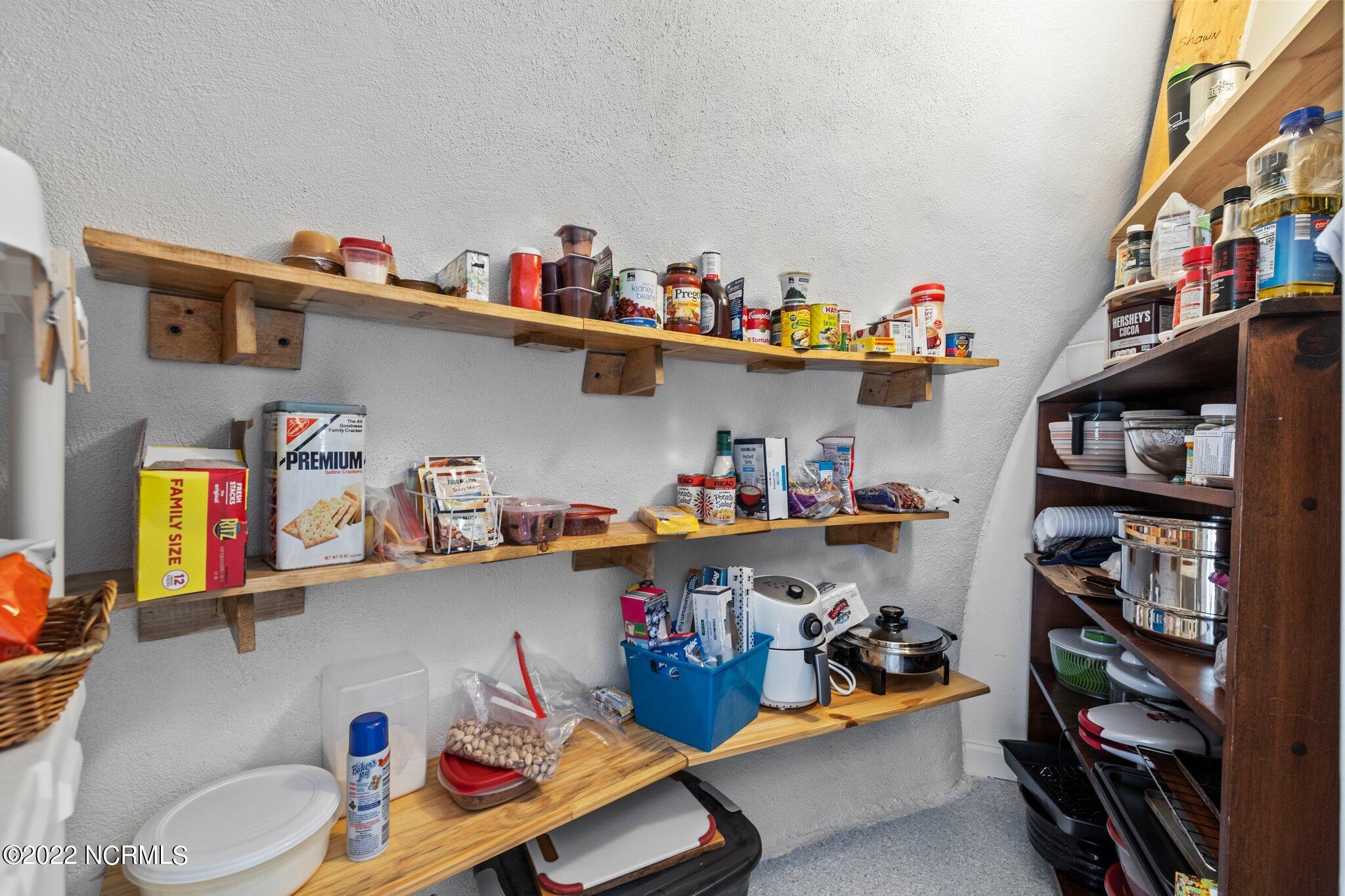 120 Pinebluff Lake Road Pinebluff, NC 28373 - Photo 31 of 40 Pantry with curved shelves.