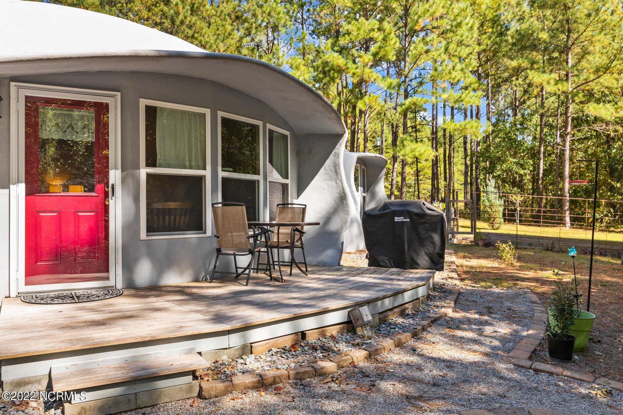 120 Pinebluff Lake Road Pinebluff, NC 28373 - Photo 9 of 40 Back deck is great for watching birds at the many feeders.