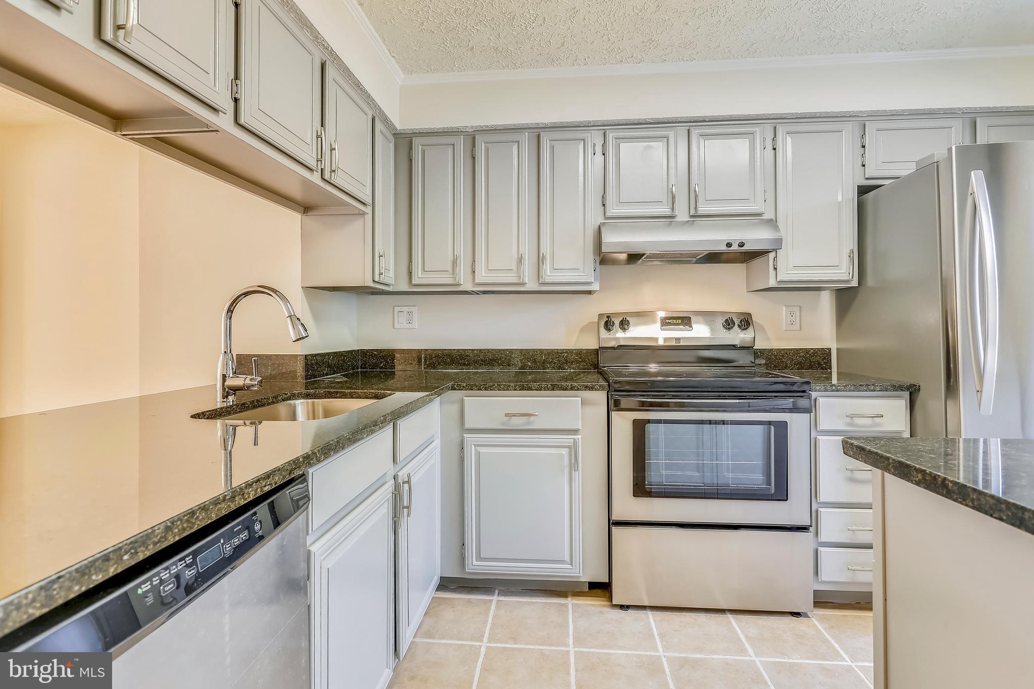 2943 Shepperton Terrace Silver Spring, MD 20904 - Photo 3 of 37 Modern Kitchen w/ granite tops & new SS appliances