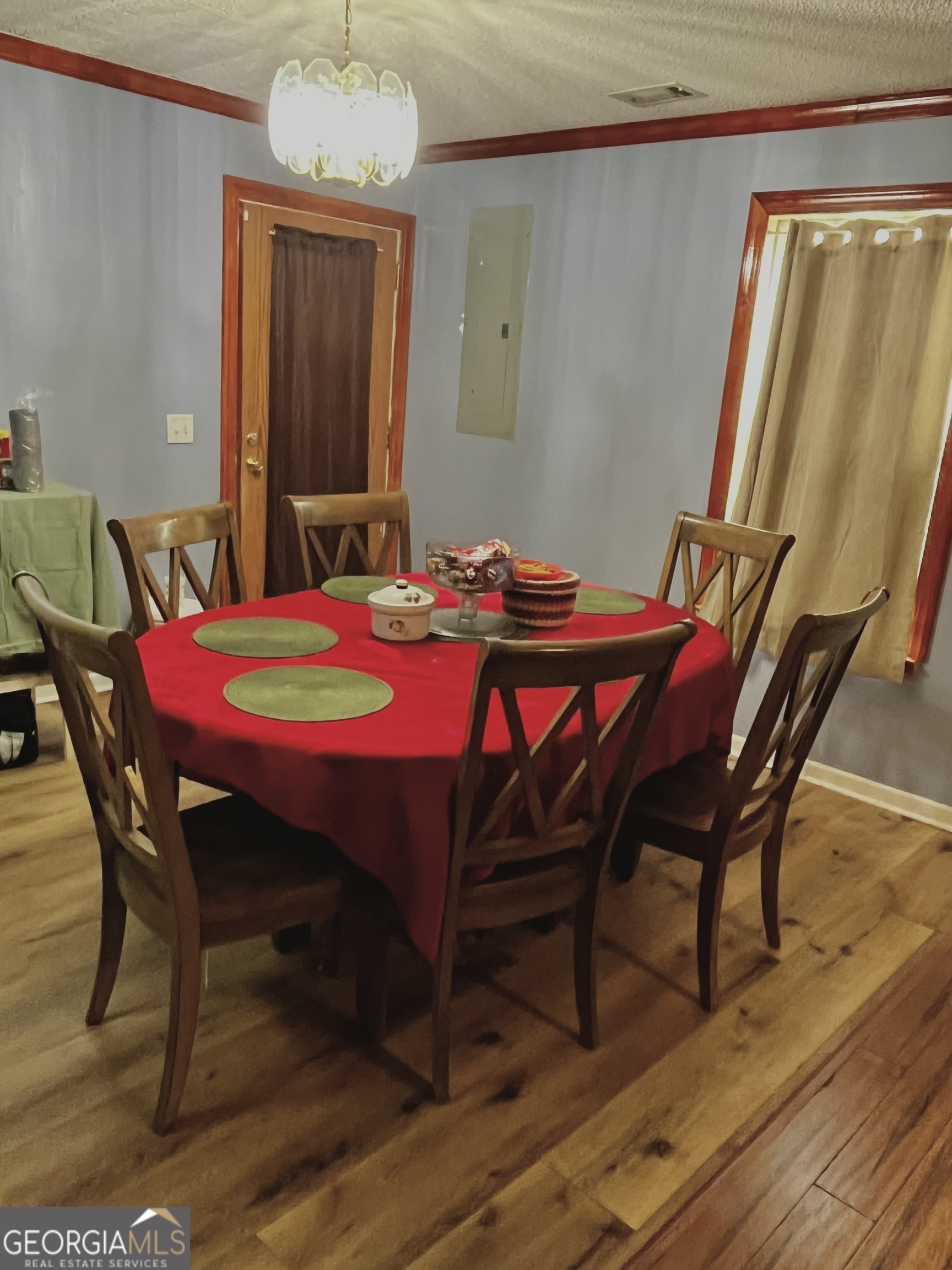 705 Geiger Street Mount Vernon, GA 30445 - Photo 6 of 11 a dining room with furniture and window