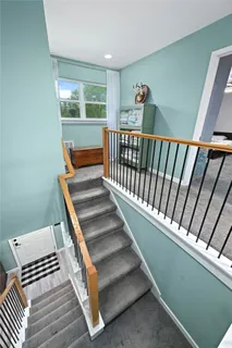 a bedroom with a bed and a desk