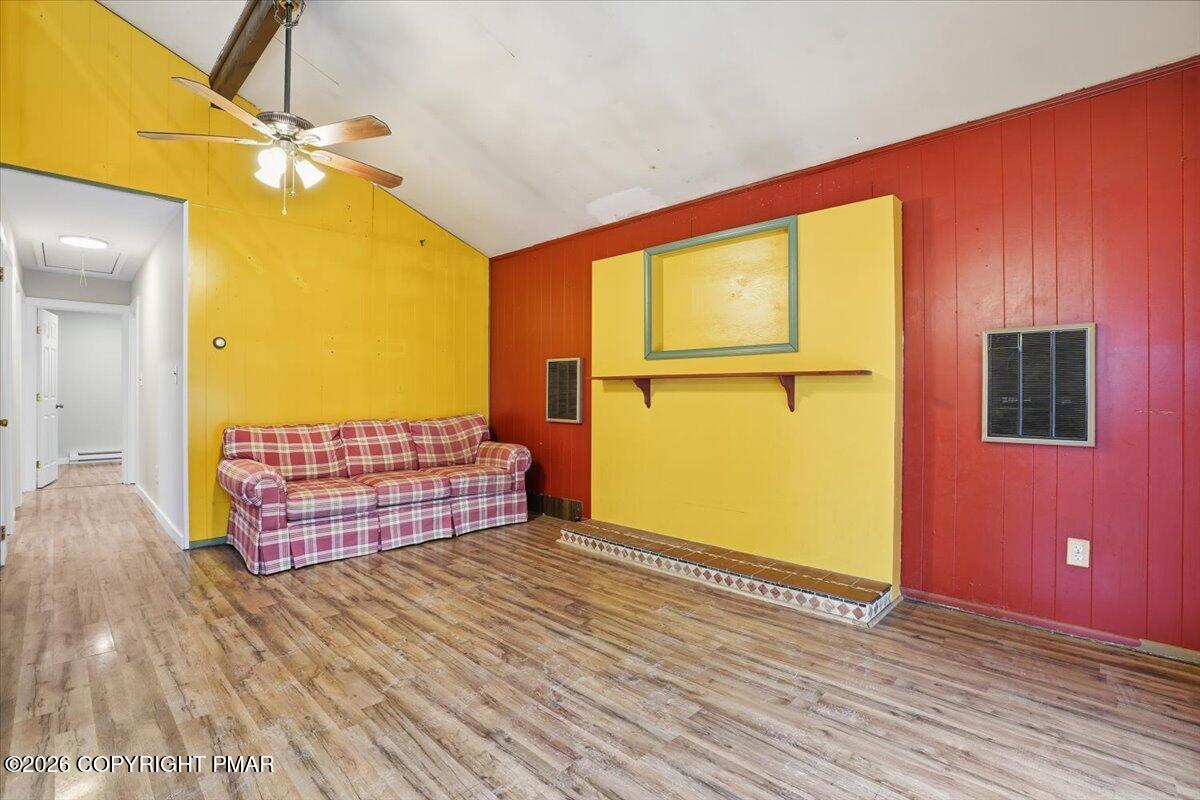 401 Clearview Drive Long Pond, PA 18334 - Photo 12 of 77 a view of an empty room with wooden floor and a window