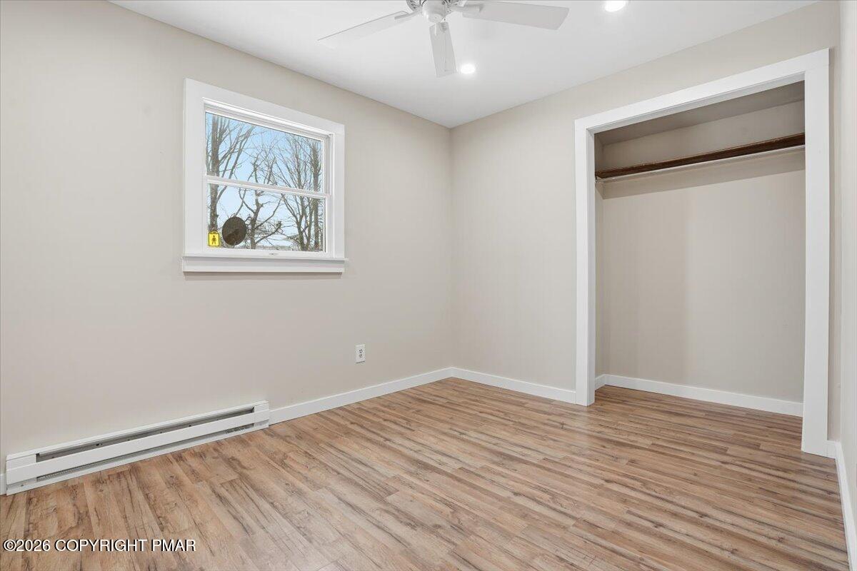 401 Clearview Drive Long Pond, PA 18334 - Photo 25 of 77 wooden floor in an empty room