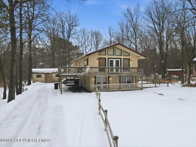 a front view of a house with a porch