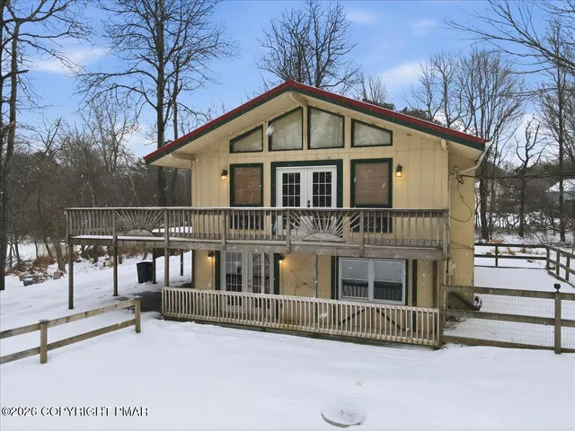 a view of a house with a deck