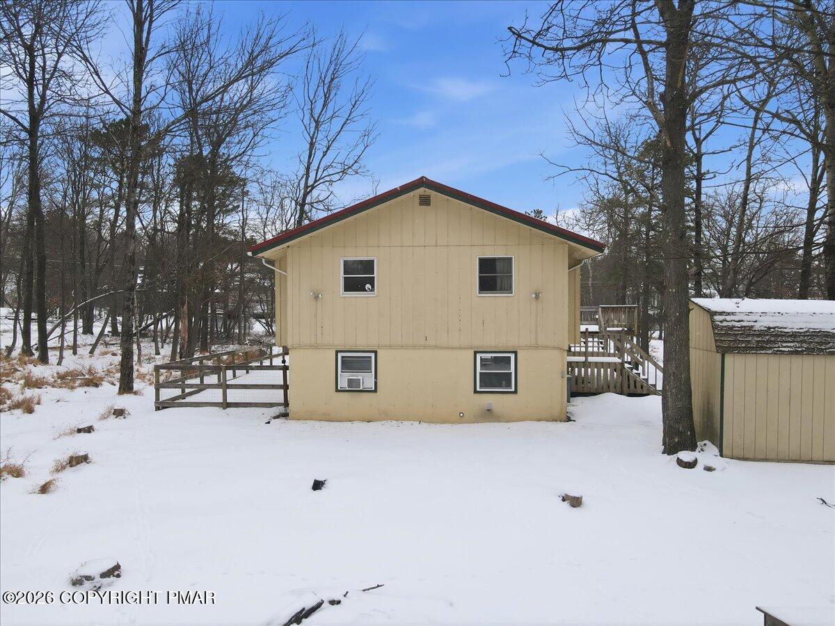 401 Clearview Drive Long Pond, PA 18334 - Photo 51 of 77 a view of a house with a yard covered in snow