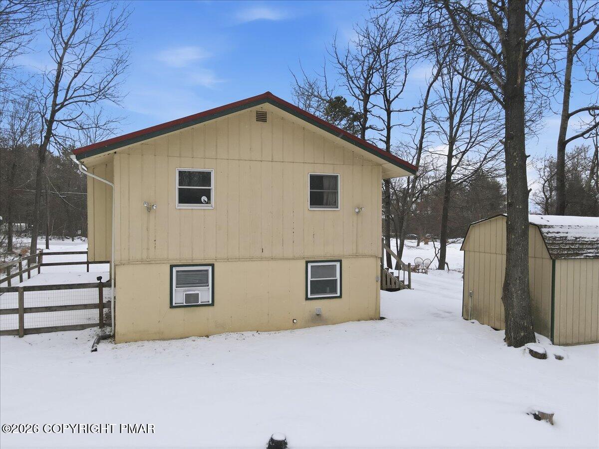 401 Clearview Drive Long Pond, PA 18334 - Photo 53 of 77 a view of a house with a yard covered in snow