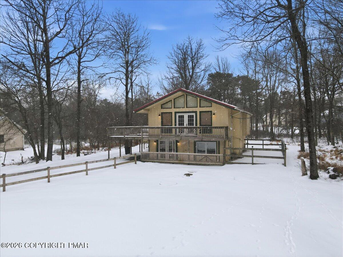 401 Clearview Drive Long Pond, PA 18334 - Photo 64 of 77 a view of house with a yard covered in snow