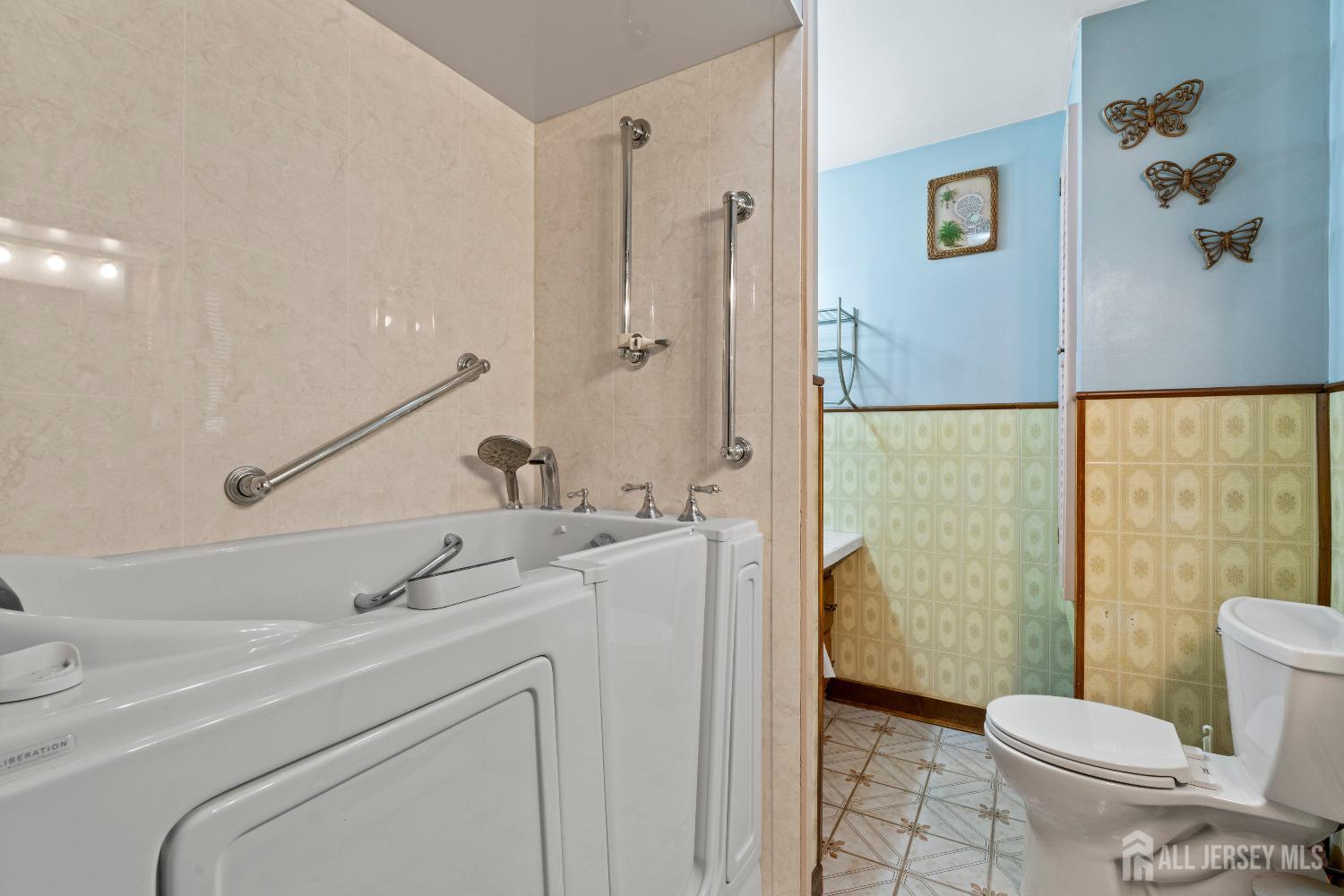 70 Central Avenue Sewaren, NJ 07064 - Photo 17 of 22 a bathroom with a sink a toilet and shower