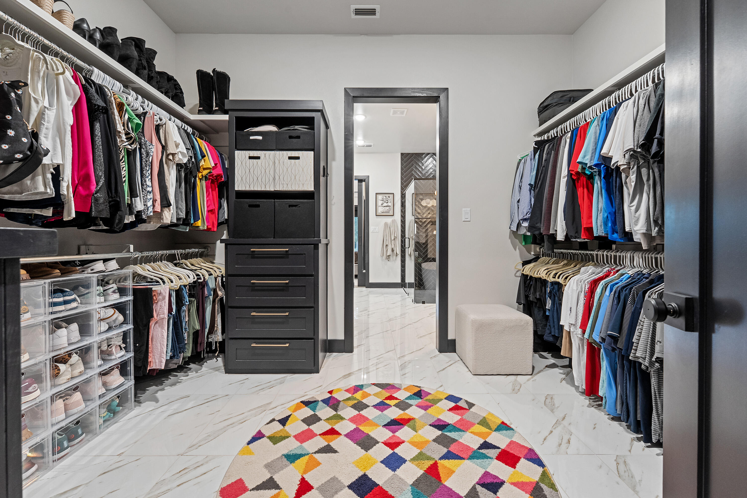 3923 149th Street Lubbock, TX 79423 - Photo 26 of 57 a view of walk in closet with clothes and shoes
