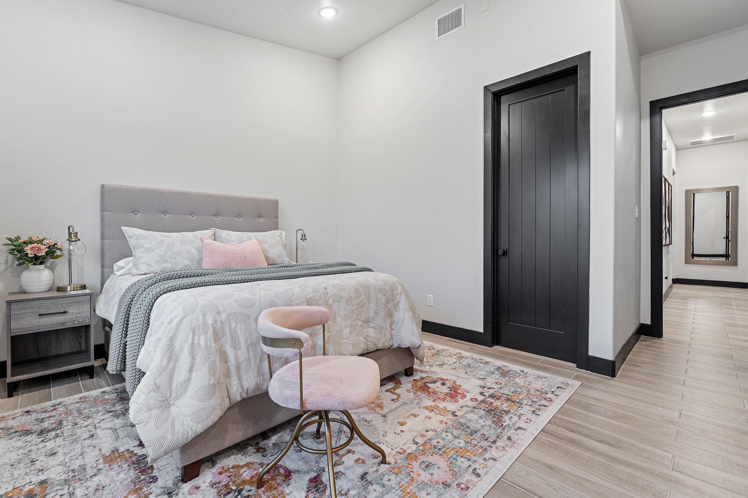 3923 149th Street Lubbock, TX 79423 - Photo 29 of 57 a bedroom with a bed and a dresser