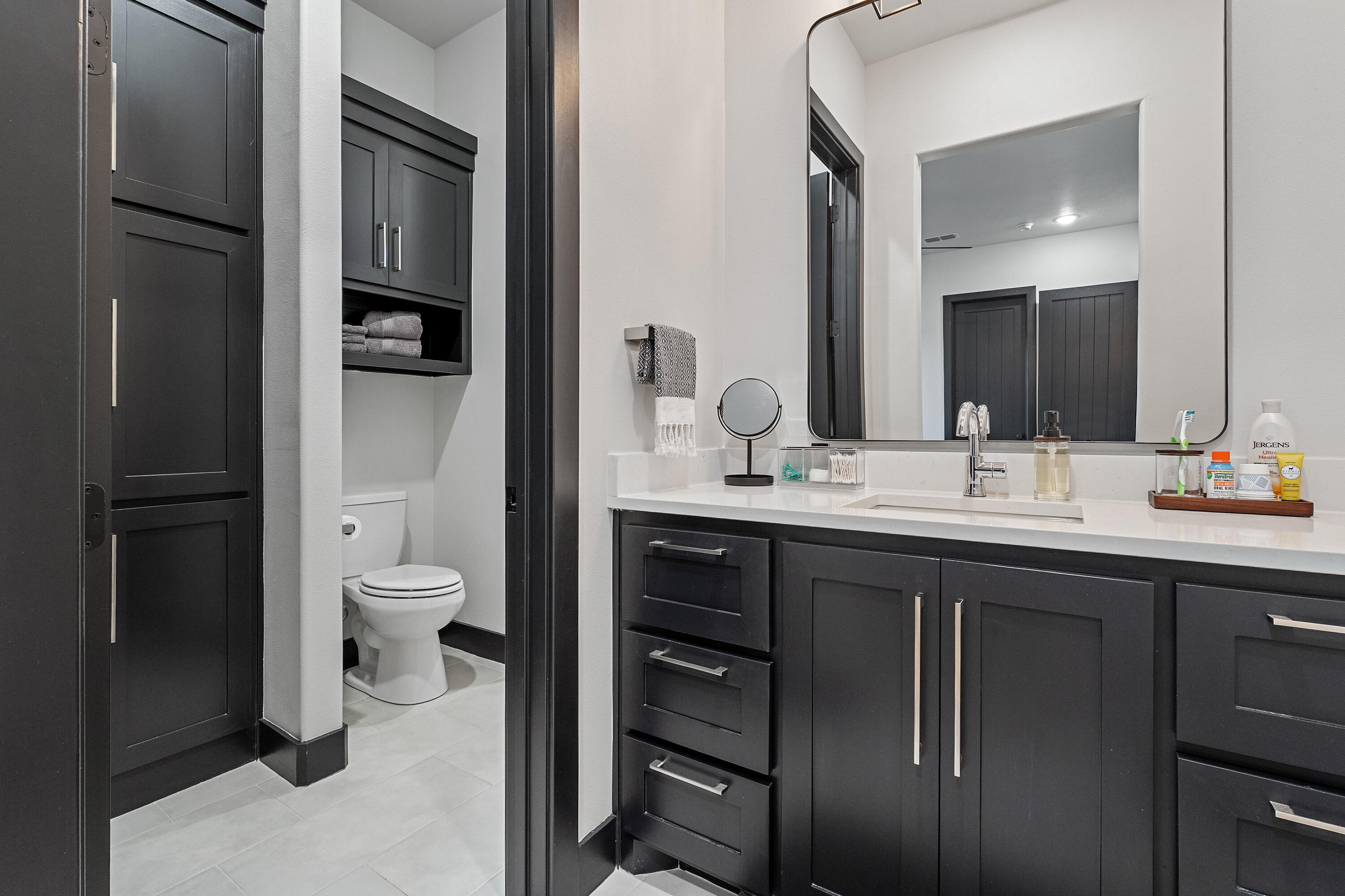 3923 149th Street Lubbock, TX 79423 - Photo 30 of 57 a bathroom with a sink toilet and shower