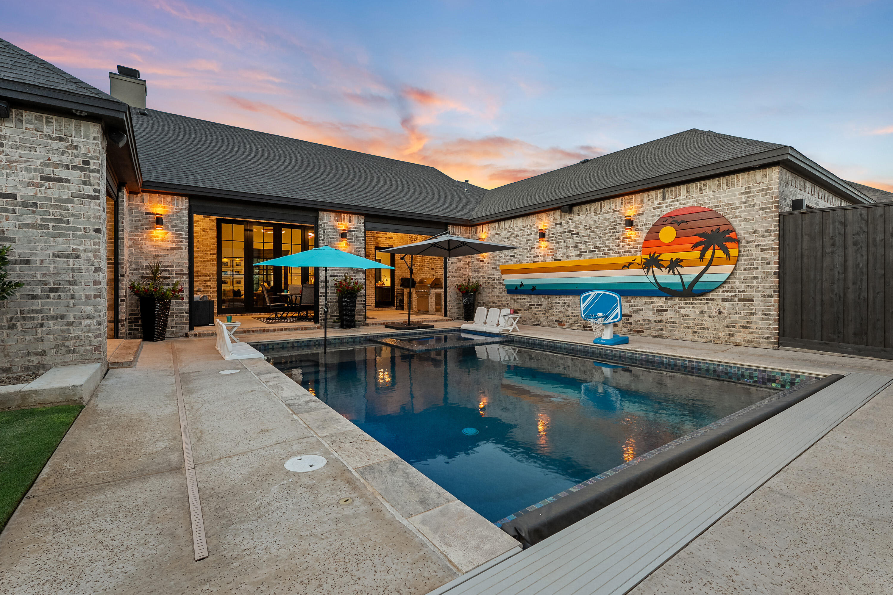 3923 149th Street Lubbock, TX 79423 - Photo 43 of 57 an outdoor space with swimming pool and furniture