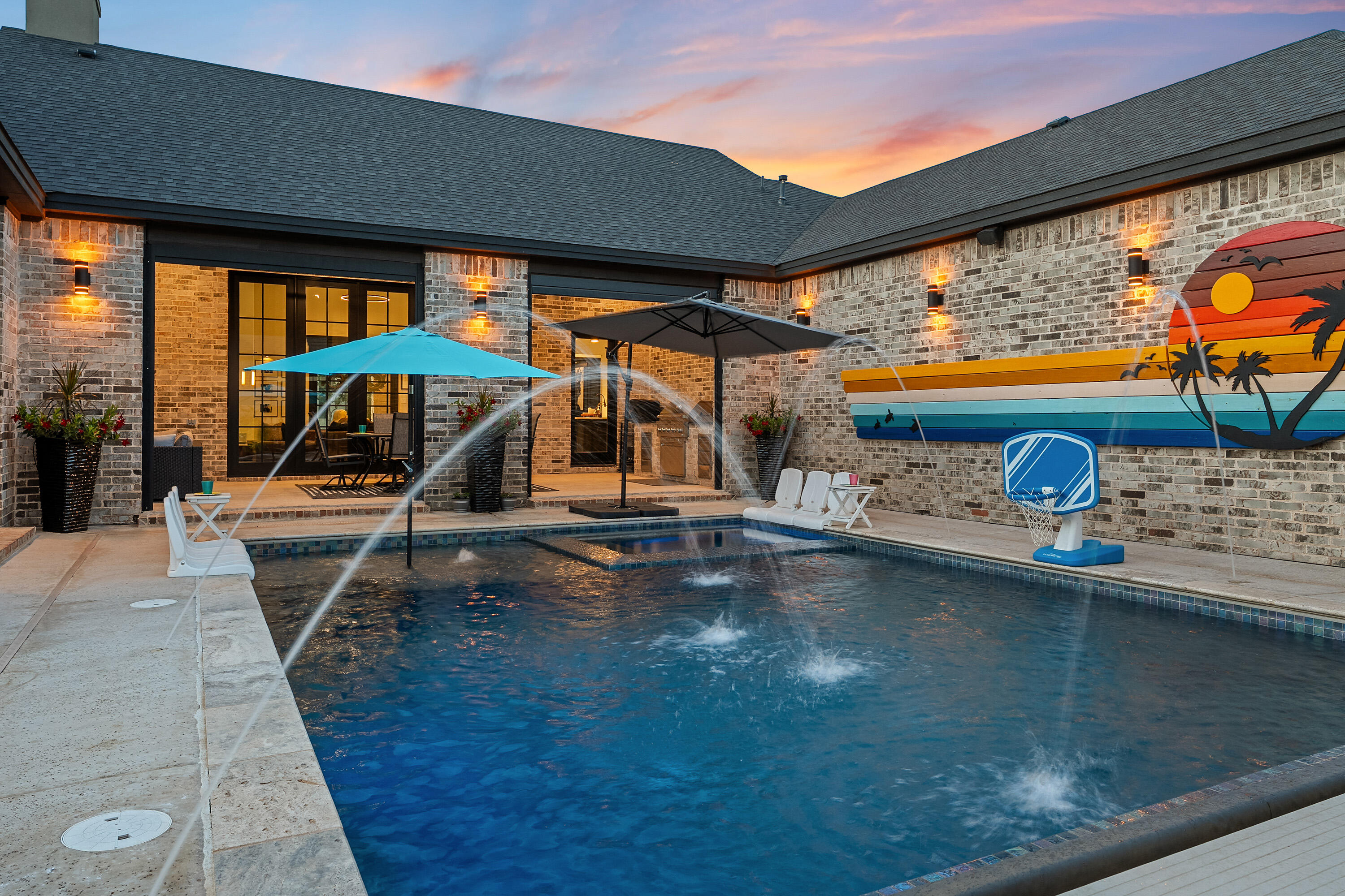 3923 149th Street Lubbock, TX 79423 - Photo 46 of 57 a view of a swimming pool with a lounge chair