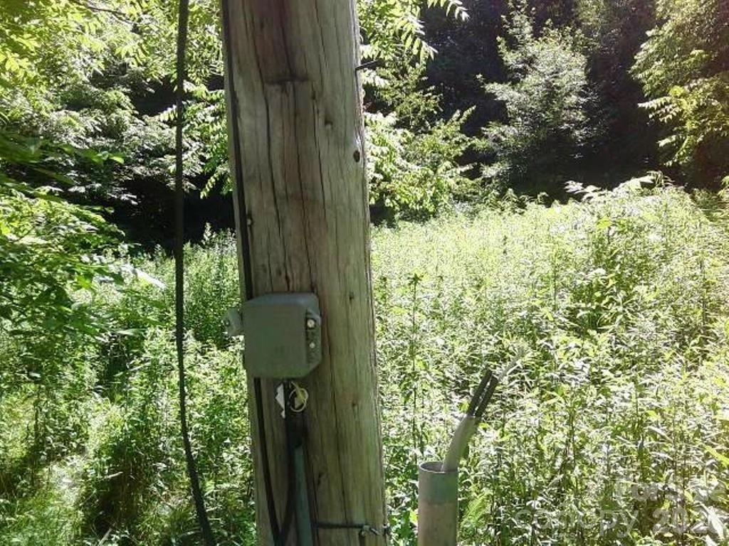 3771 Highway 421 Vilas, NC 28692 - Photo 11 of 18 a view of a house with a tree