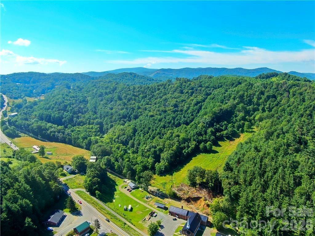 3771 Highway 421 Vilas, NC 28692 - Photo 2 of 18 an aerial view of a houses with a yard