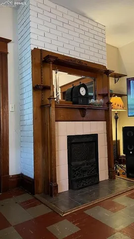 a stove top oven sitting inside of a kitchen
