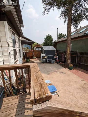 a view of house with outdoor seating space