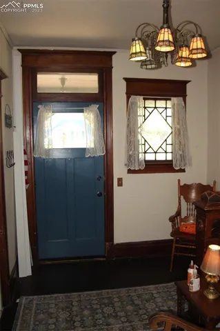 a water heater on the side of a window