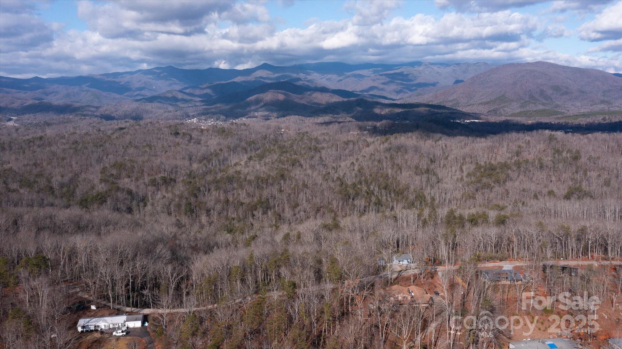 182 Warren Ridge Drive, Unit 7 Old Fort, NC 28762 - Photo 17 of 19 a view of a dry yard with wooden floor and fence