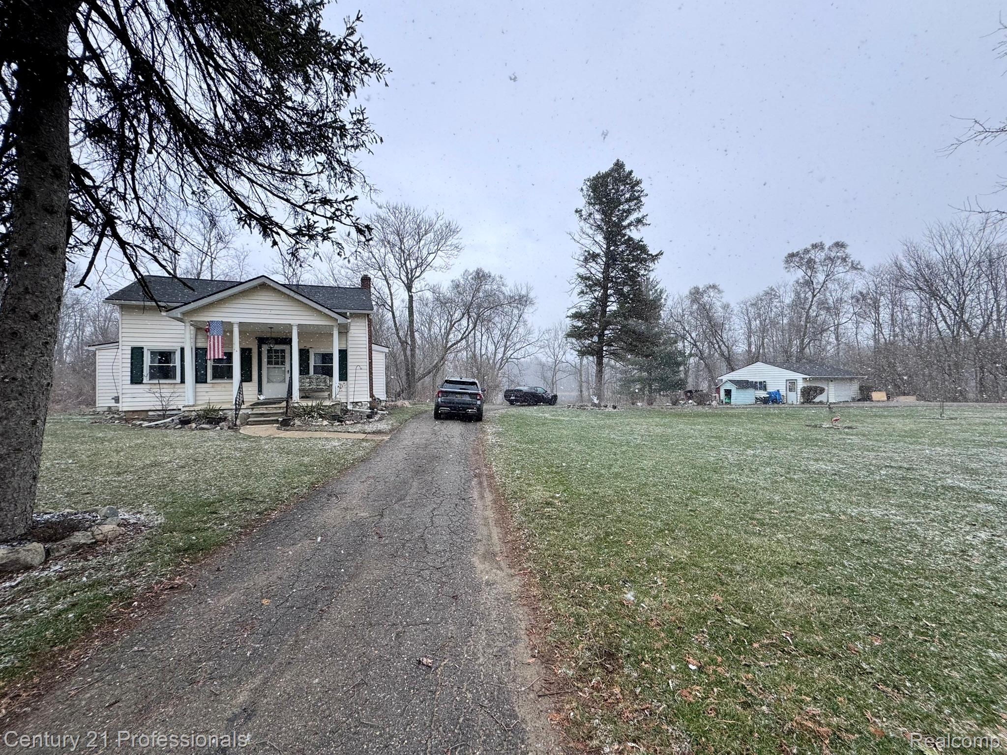 2021 West Rose Center Road Holly, MI 48442 - Photo 2 of 30 View of asphalt driveway