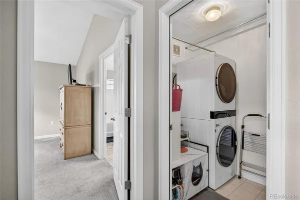 a view of bathroom with washer and dryer