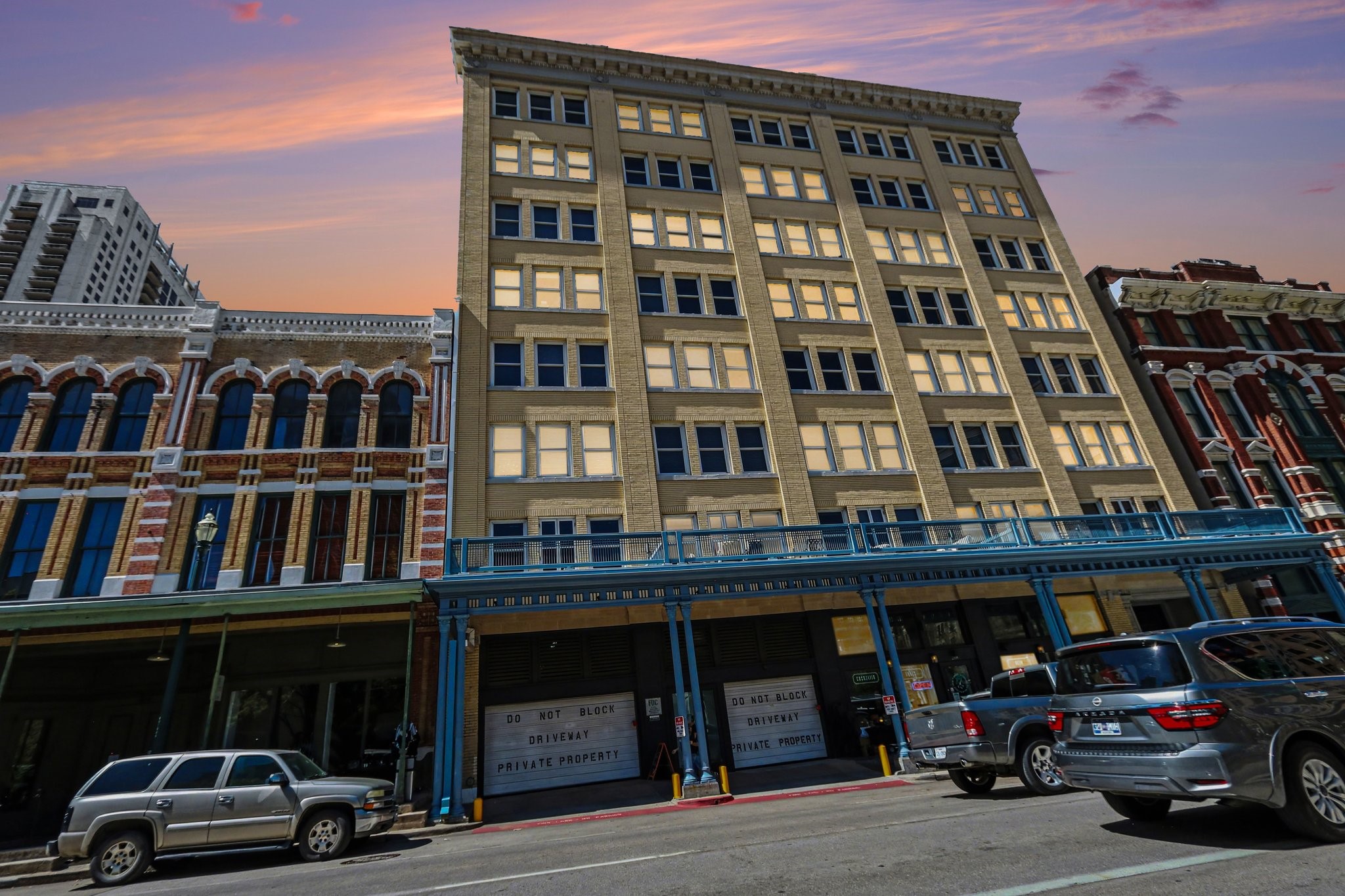 204 Travis Street, Unit 4E Houston, TX 77002 - Photo 27 of 29 a view of a car parked in front of a building