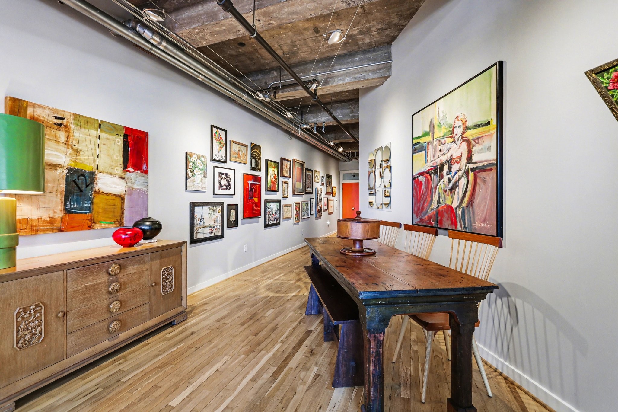 204 Travis Street, Unit 4E Houston, TX 77002 - Photo 3 of 29 a view of a dining room with furniture