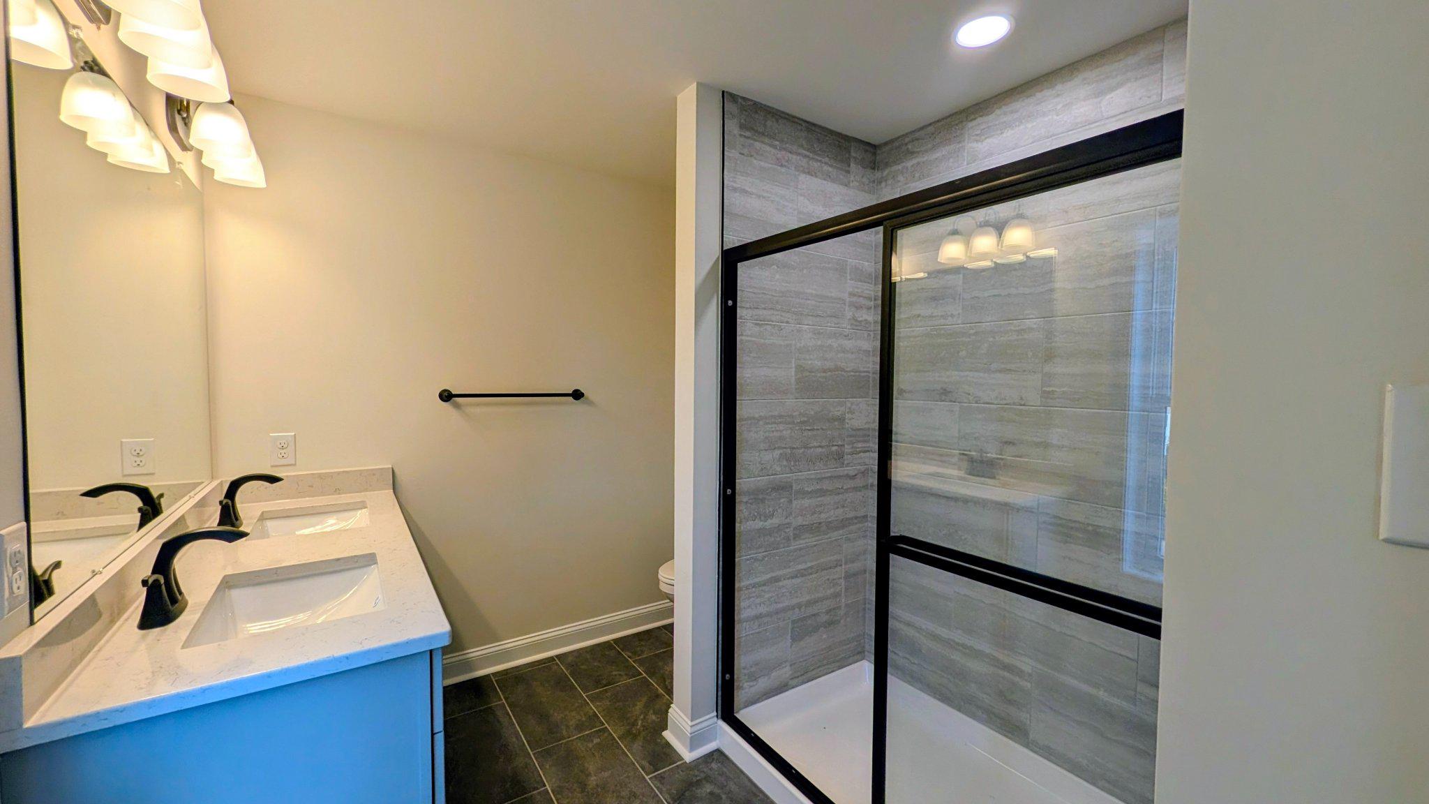 425 Rutledge Avenue Folsom, PA 19033 - Photo 23 of 33 Private primary bathroom with stylish finishes.