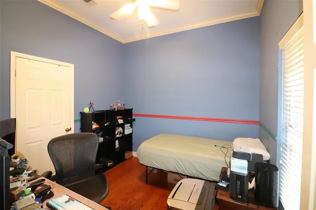 a room with furniture and wooden floor