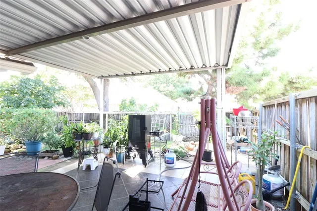 a view of an outdoor sitting area with furniture