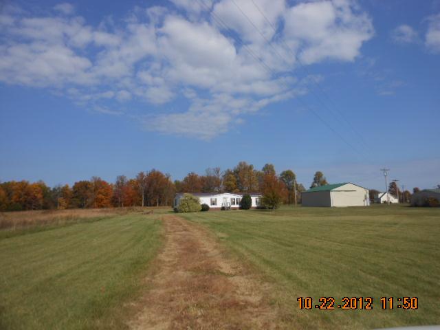 1401 Mt Vernon Road Bethpage, TN 37022 - Photo 1 of 1 a view of a field with large trees