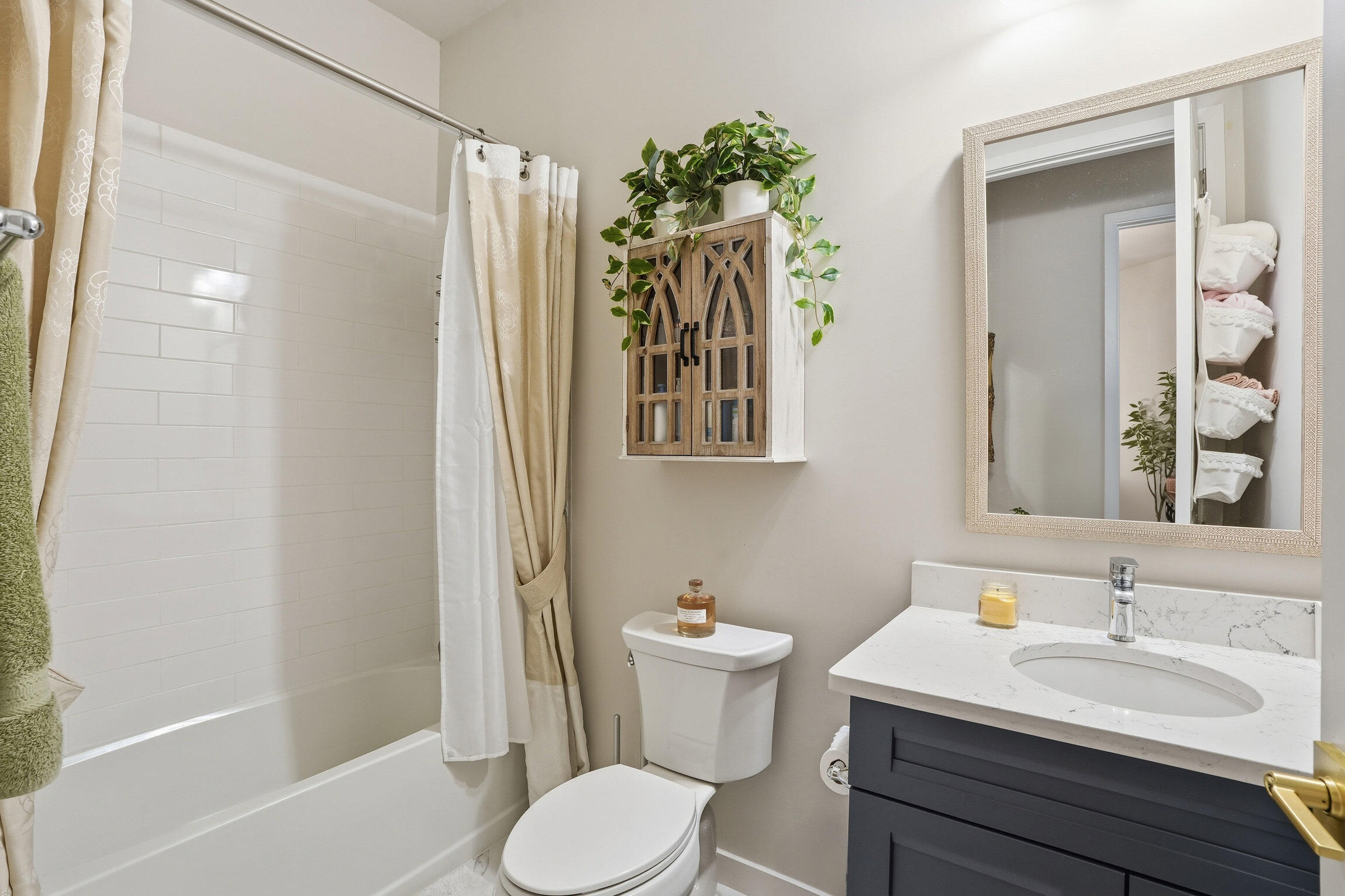 14708 Kingfisher Loop Naples, FL 34120 - Photo 27 of 42 a bathroom with a sink vanity mirror and toilet