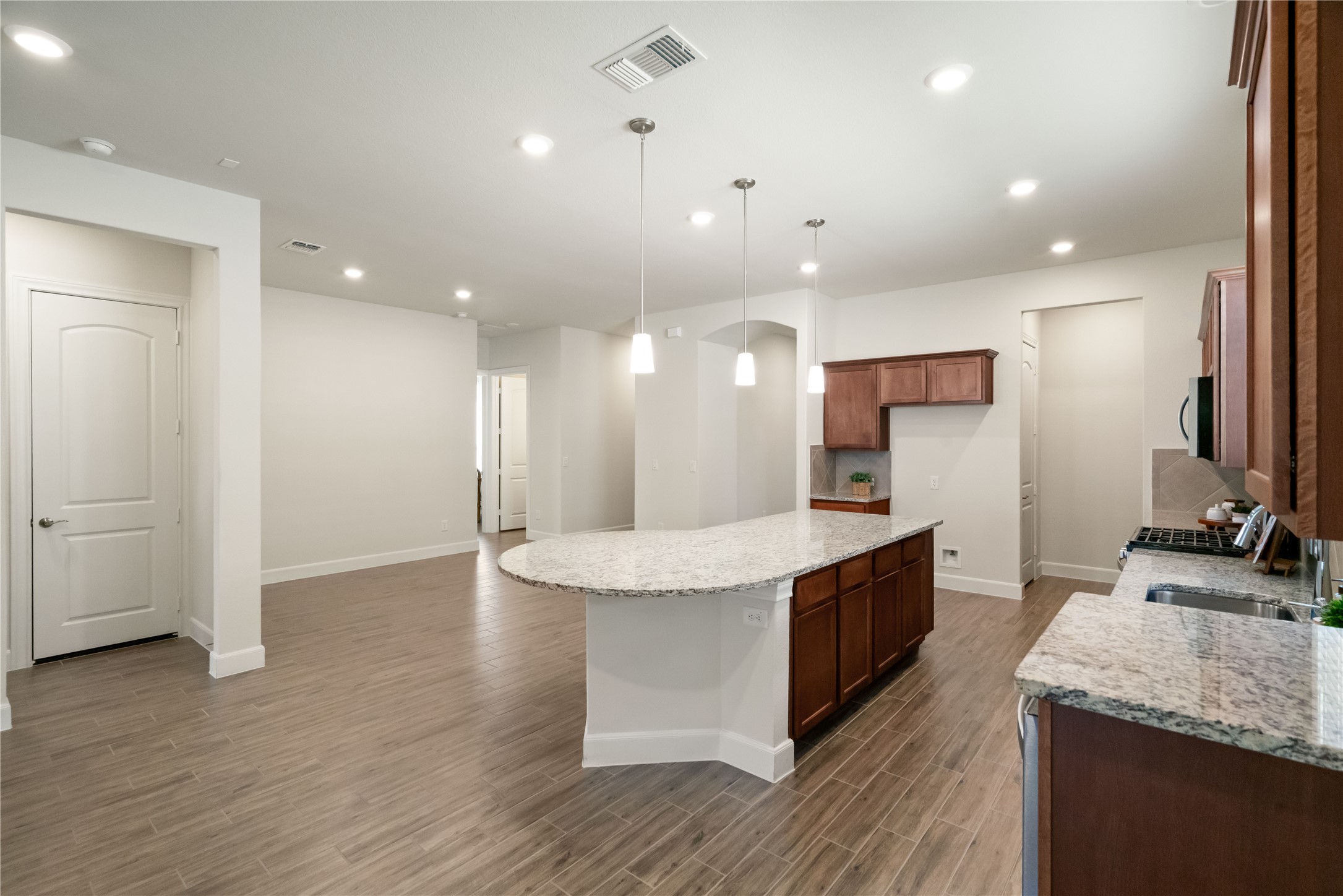 516 Nokota Drive Spring, TX 77382 - Photo 6 of 33 Lovely pendant lighting over island.