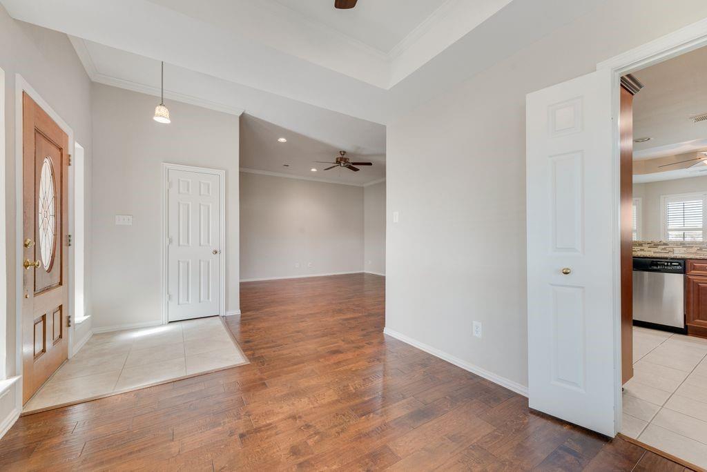 11374 Jennifer Circle Forney, TX 75126 - Photo 13 of 36 Entryway featuring ceiling fan, ornamental molding, light tile patterned flooring, and recessed lighting