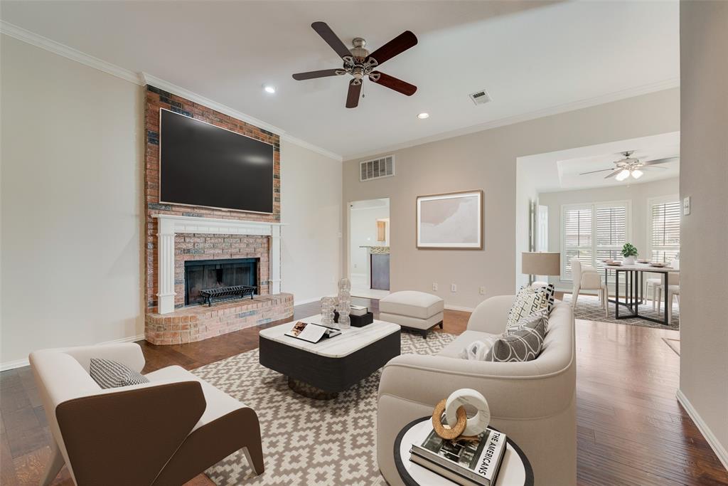 11374 Jennifer Circle Forney, TX 75126 - Photo 7 of 36 AI generated Living room with a ceiling fan, wood finished floors, recessed lighting, ornamental molding, and a fireplace.