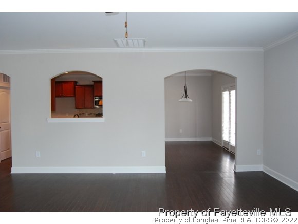 1024 Micahs Way North Spring Lake, NC 28390 - Photo 10 of 25 a view of a hallway with wooden floor