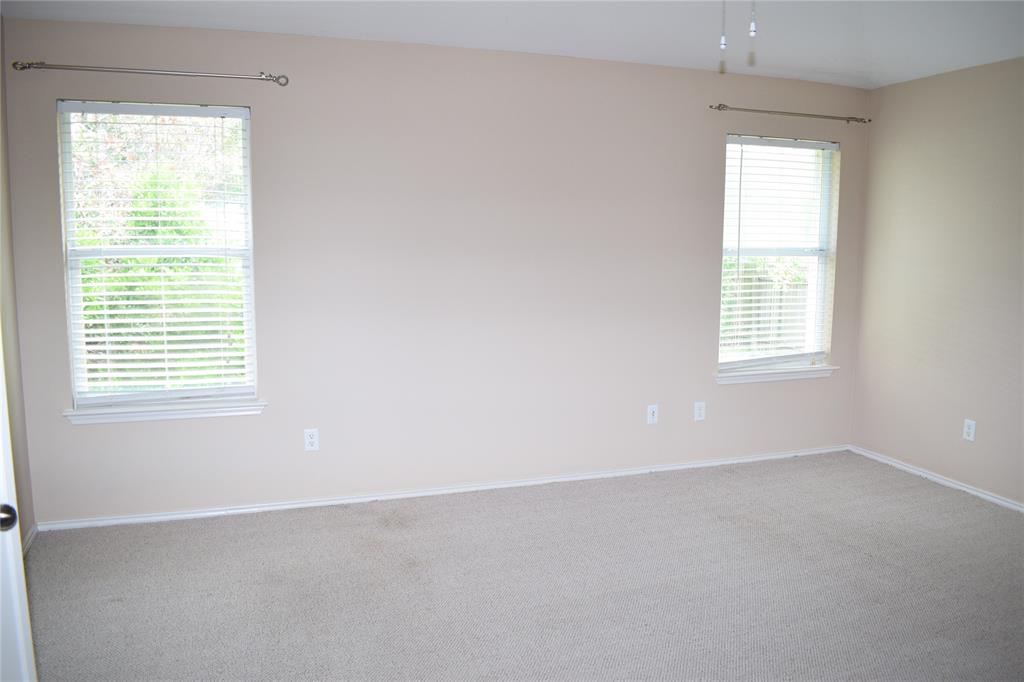 3688 Spring Canyon Trail Round Rock, TX 78681 - Photo 5 of 17 Spacious room featuring neutral carpet flooring and light-toned walls