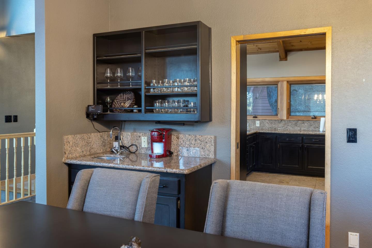 22125 Miller Ridge Road Los Gatos, CA 95033 - Photo 13 of 35 a kitchen with stainless steel appliances granite countertop a refrigerator and stove