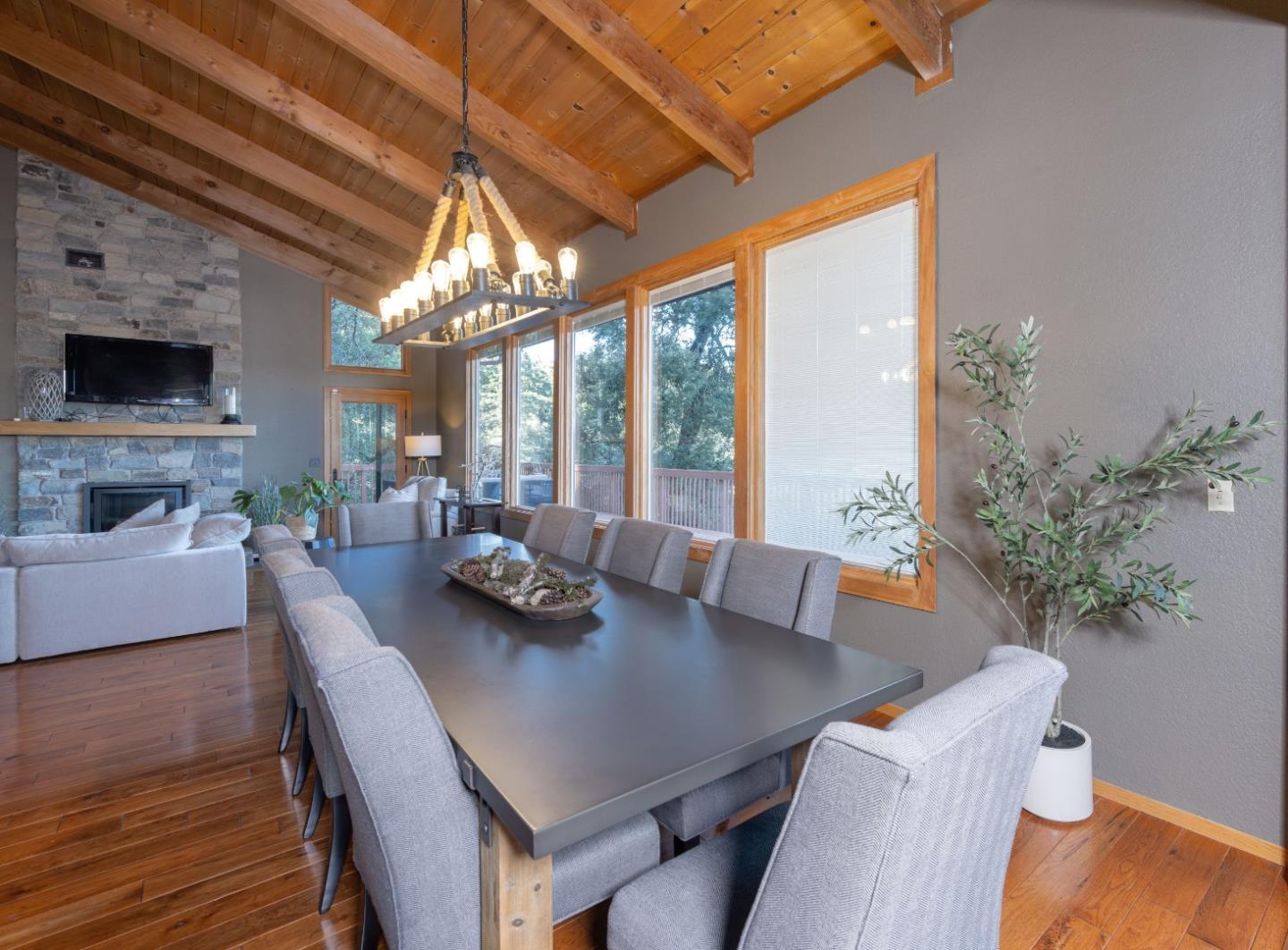 22125 Miller Ridge Road Los Gatos, CA 95033 - Photo 14 of 35 a view of a dining room with furniture window and wooden floor