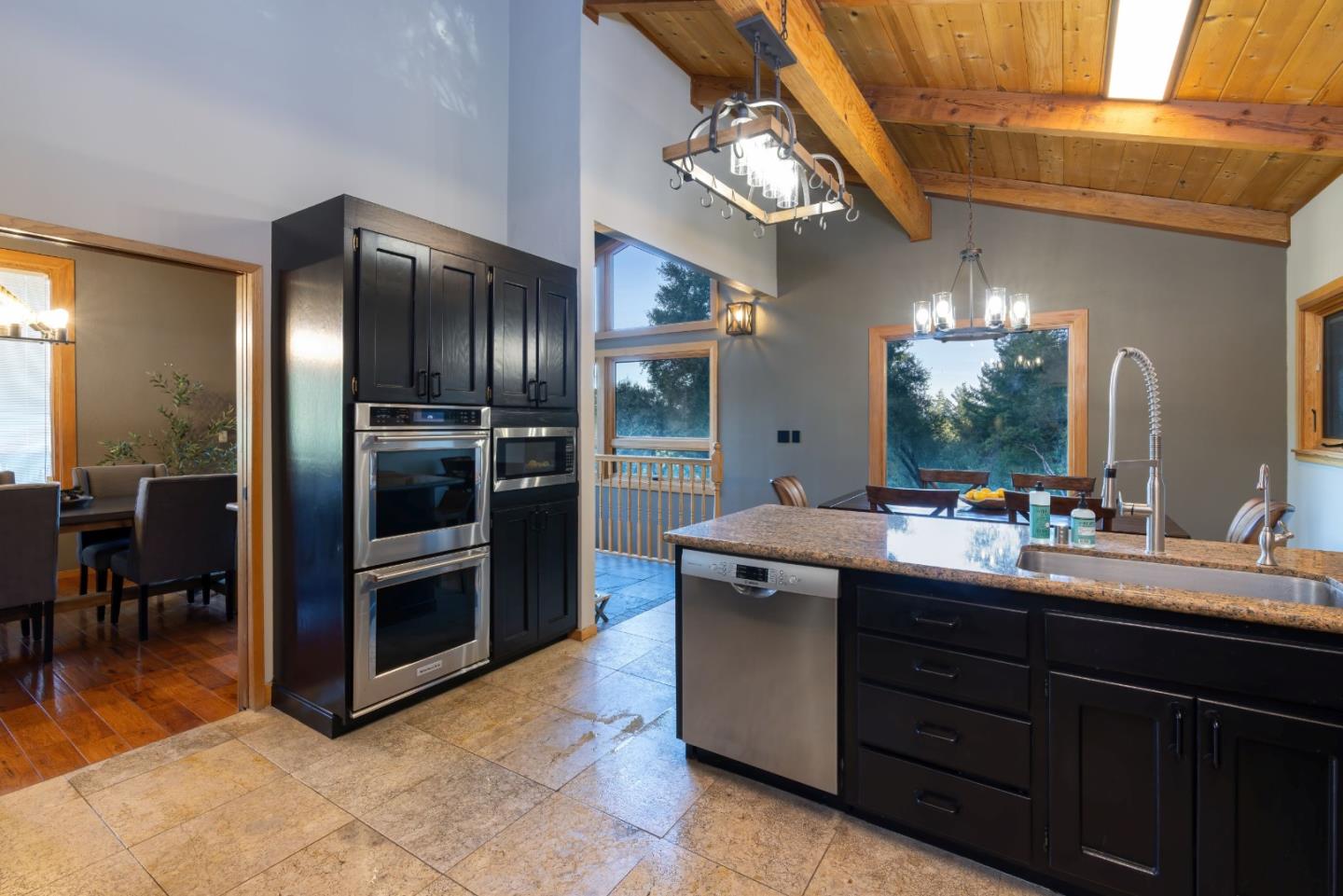 22125 Miller Ridge Road Los Gatos, CA 95033 - Photo 18 of 35 a kitchen with a sink and stainless steel appliances