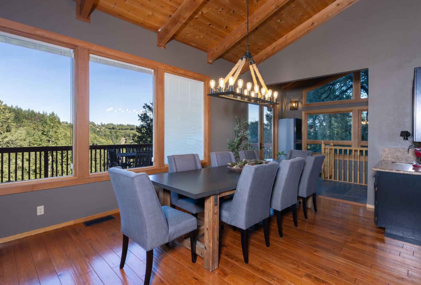 22125 Miller Ridge Road Los Gatos, CA 95033 - Photo 2 of 35 a view of a dining room with furniture window and wooden floor