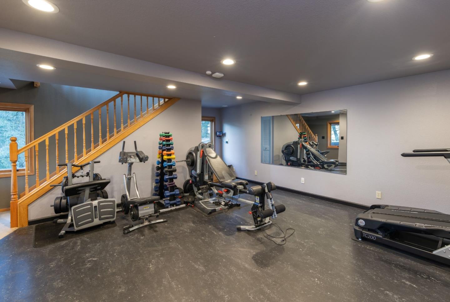 22125 Miller Ridge Road Los Gatos, CA 95033 - Photo 31 of 35 a view of a room with gym equipment