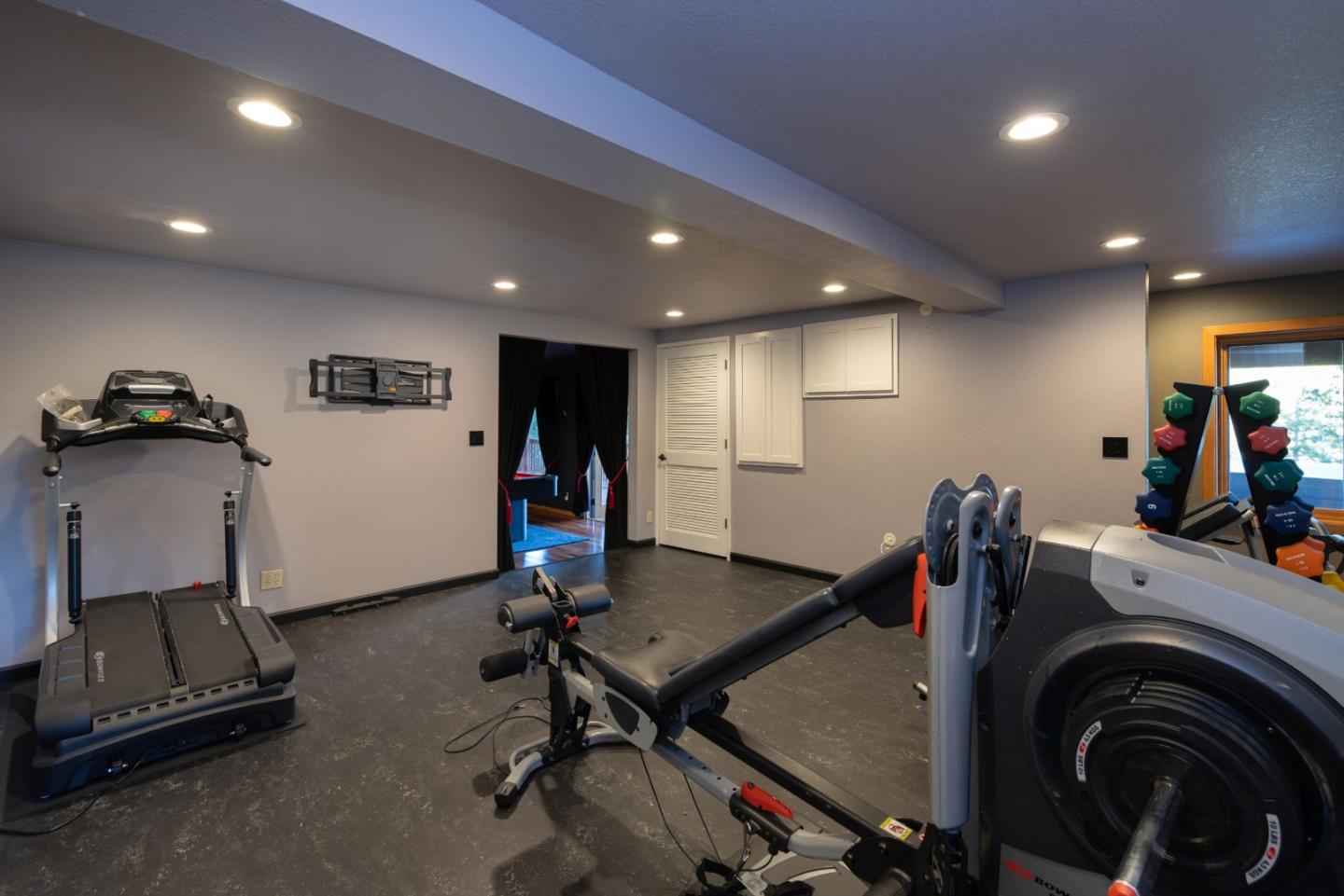 22125 Miller Ridge Road Los Gatos, CA 95033 - Photo 35 of 35 a view of a room with gym equipment