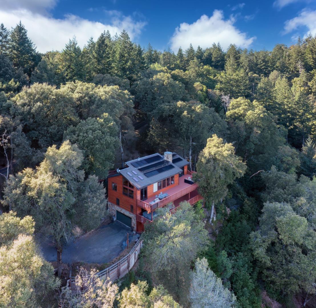 22125 Miller Ridge Road Los Gatos, CA 95033 - Photo 10 of 35 an aerial view of a house with a yard