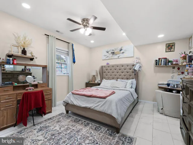 a bedroom with a bed and furniture